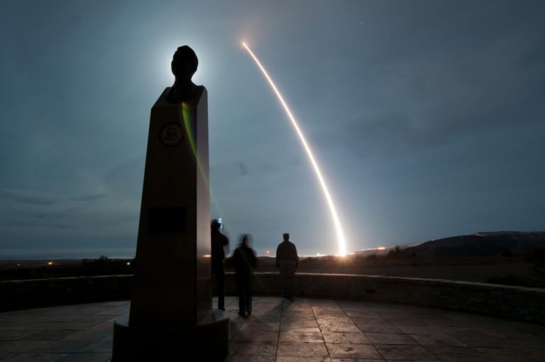 person watching a rocket launch