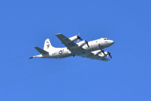  A P-3C Orion navy plane in the sky
